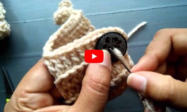 How to sew in button to crochet