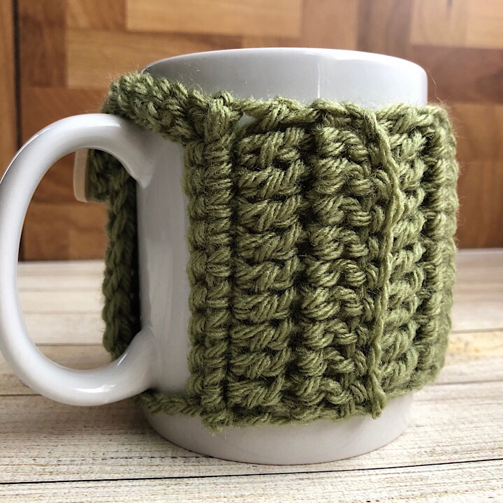 Haniyyah's Mug Cozy in pistachio green