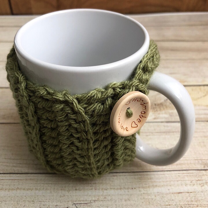 Haniyyah's Mug Cozy in pistachio green