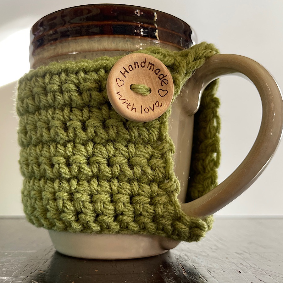 Haniyyah’s Crochet Mug Cozies green